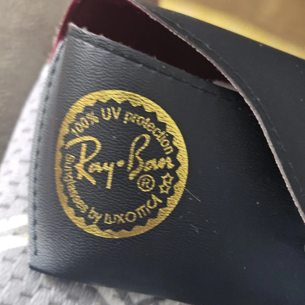 Ray-Ban Women's Silver Frame Sunglasses with Black Case